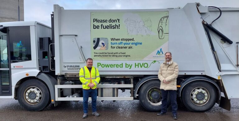 A HVO-powered refuse collection vehicle with Councillor Tony Gurney, Cabinet Member for Green Environment and Economy, and Phil Diffin, Assistant Manager for Waste Resources at North Ayrshire Council, Scotland.