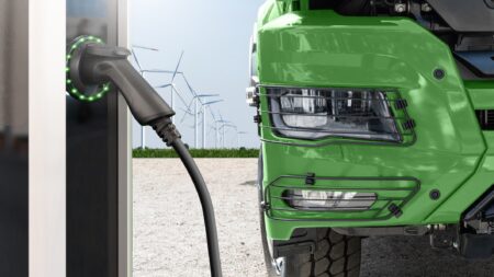 Electric truck with charging station
