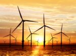 Offshore windfarm in sunset