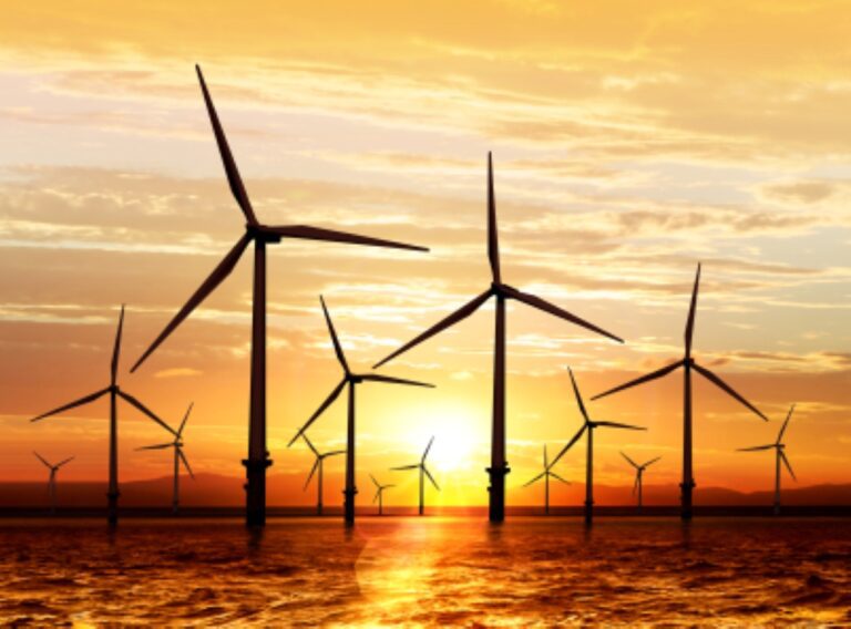 Offshore windfarm in sunset
