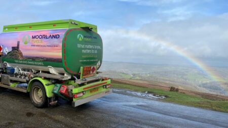 Moorland Fuels fuel tanker in front of rainbow