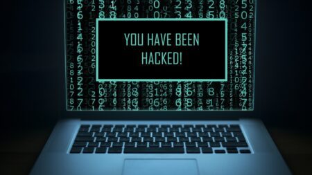 Internet crime concept. Display with message YOU HAVE BEEN HACKED