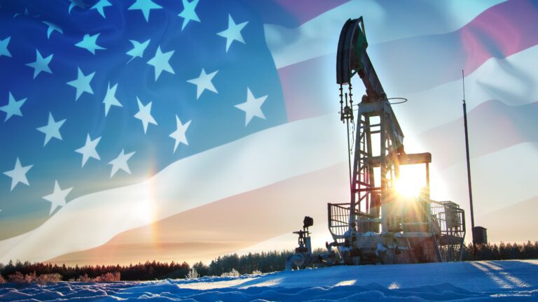 americla flag in winter with oil company