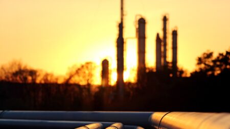 Oil refinery at sunset