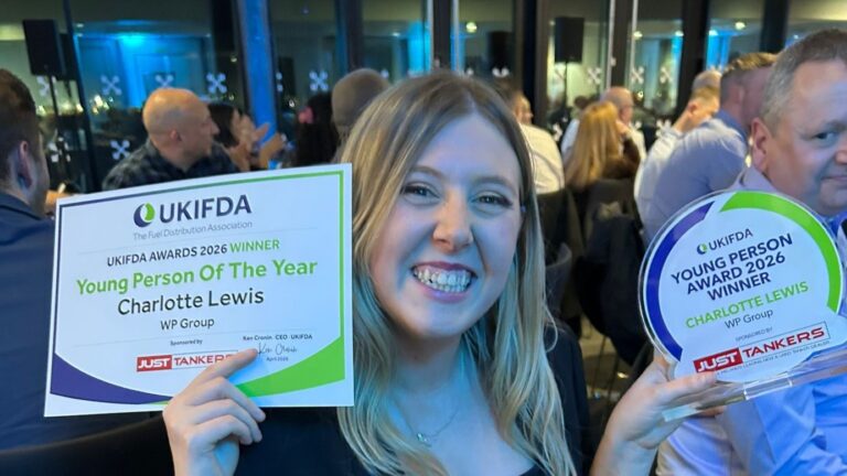 Charlotte Lewis with young person of the year trophy