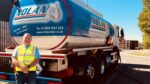 Image of Mark Nolan standing in front of fuel tanker