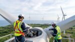 Engineers inspecting wind turbine components