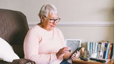 image of lady on smartphone app