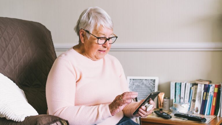 image of lady on smartphone app