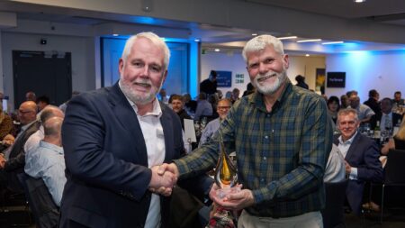Ian Walters receiving UKIFDA Driver of the Year award
