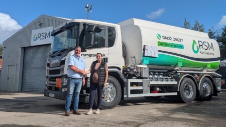 Emily taking delivery of RSM's new fuel truck